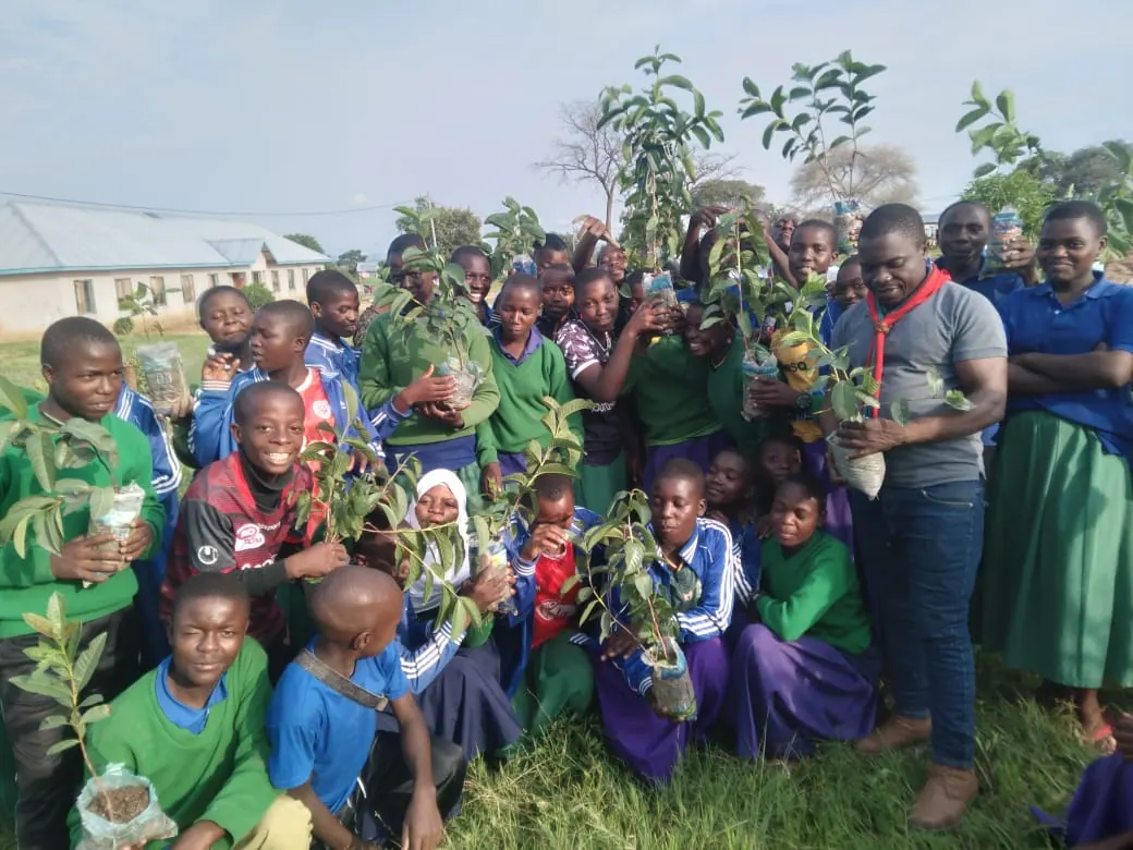 School pupils taking part in a Save the Planet environmental activity